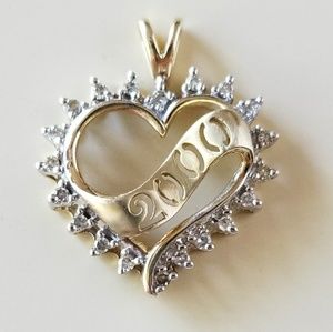 Gold and diamond heart shaped pendant.